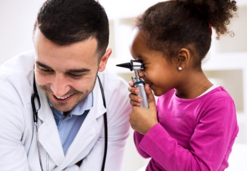 child with audiologist